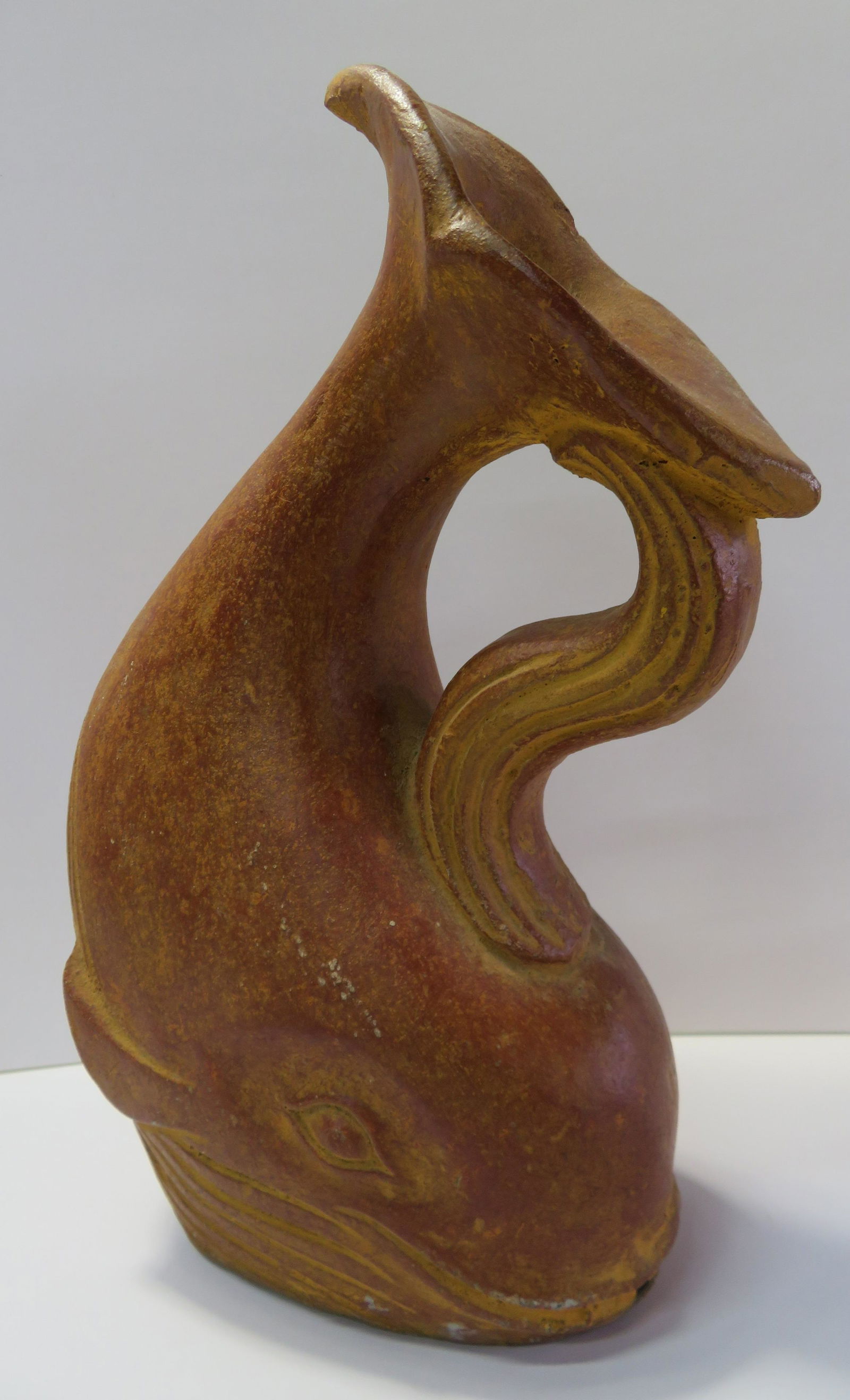 UNIQUE Hand Made Pottery WHALE PITCHER Terra Cotta MOBY: UNIQUE Hand Made Pottery WHALE PITCHER Terra Cotta MOBY DICK 12" Tall, chip off on top see pictures for condition. HANDLING and SHIPPING, USA $30. INTERNATIONAL SHIPPING, ask for an estimate. FREE DEL