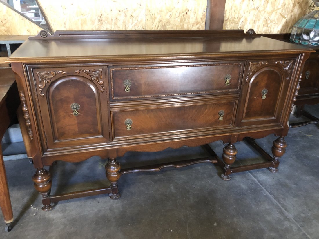 Large Walnut Buffet: This gorgeous piece matches the small buffet in lot 429.Measures 67"W x 22"D x 38"H