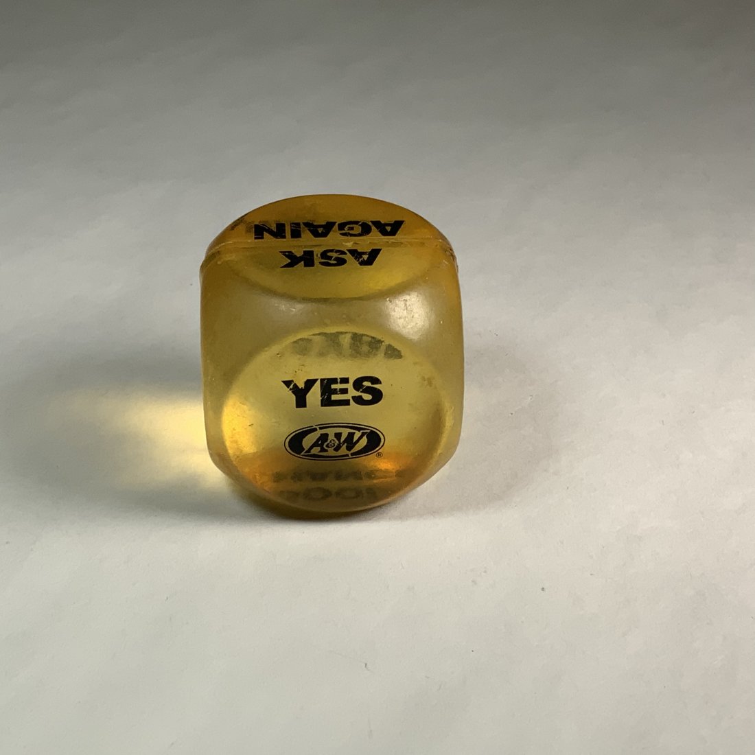 VINTAGE A&W ROOT BEER FORTUNE DICE: Vintage A&W Root Beer fortune dice. Measures 1.5 inches. Fun little advertising item or toy, depends on what you collect.
