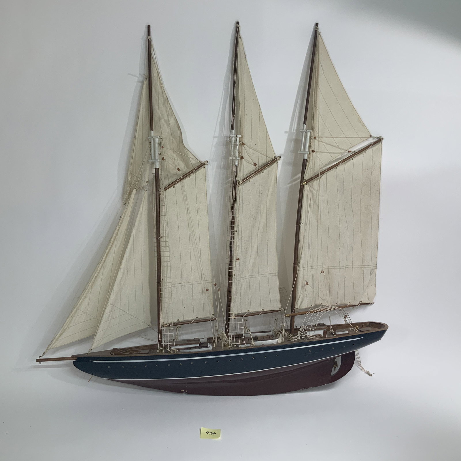 Decorative Model Ship: Large wooden model of a 3 masted schooner, with cloth sails. Approx 39 inches long and 40 inches tall. No display base.