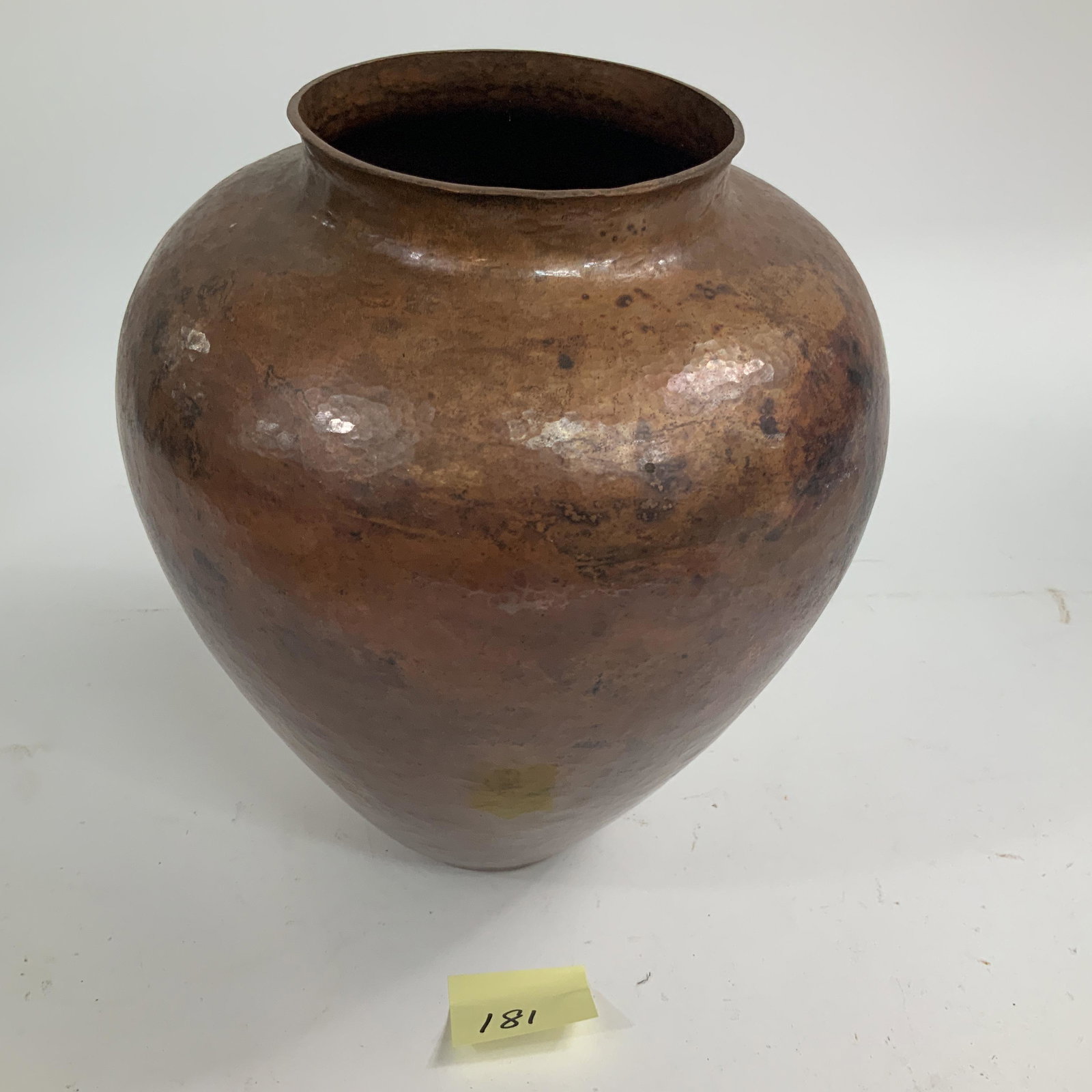 Copper pot made in Mexico: Measures 11” high Marked on bottom 2001