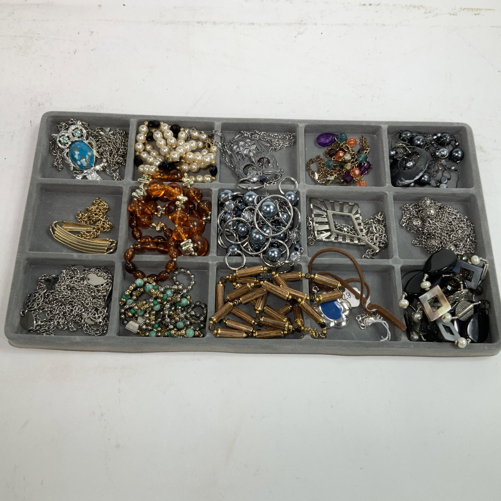 Lot of 15 Costume Jewelry Necklaces: Various materials and styles for a Mid Century Modern look.