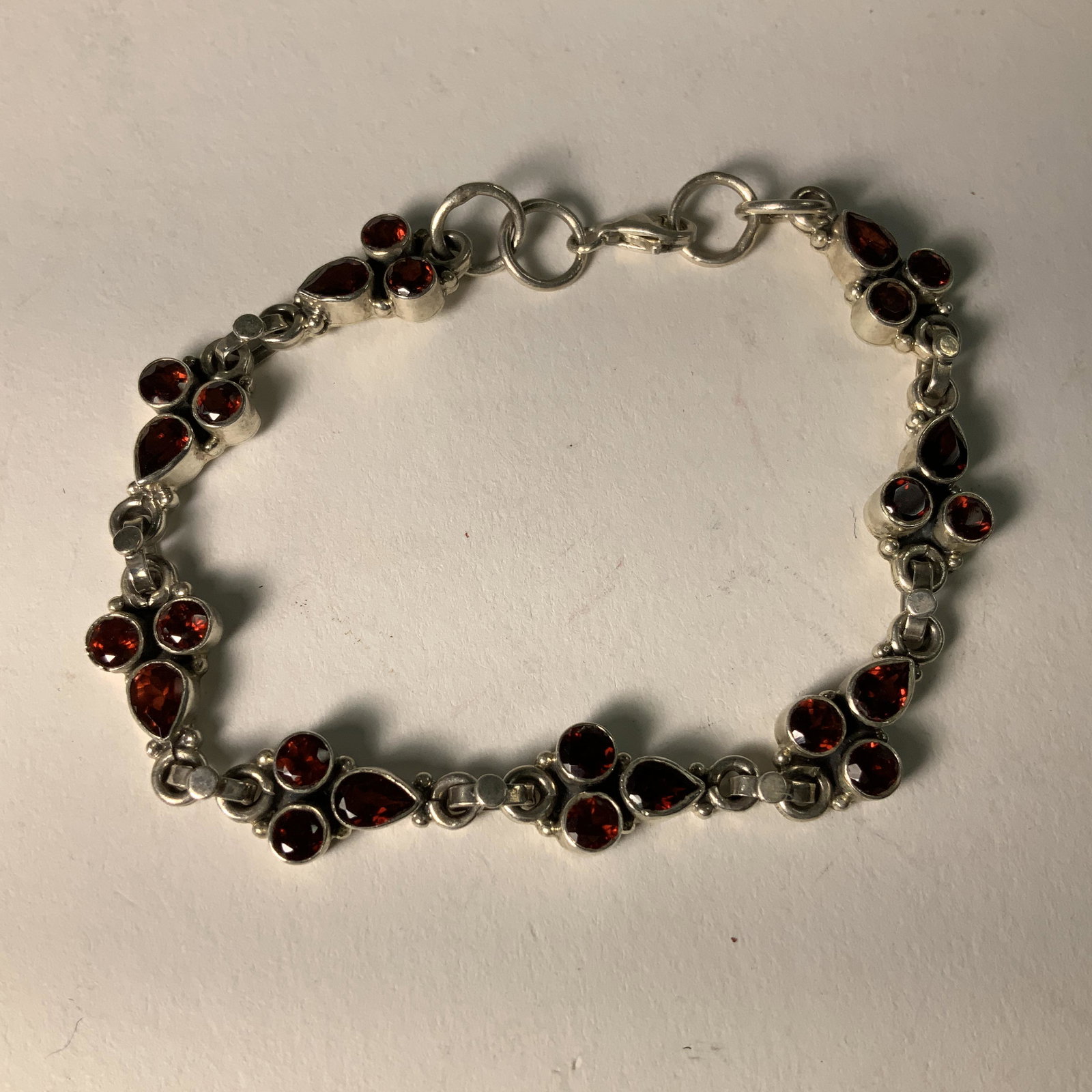 Sterling and Garnet Bracelet: Measures 8 inch