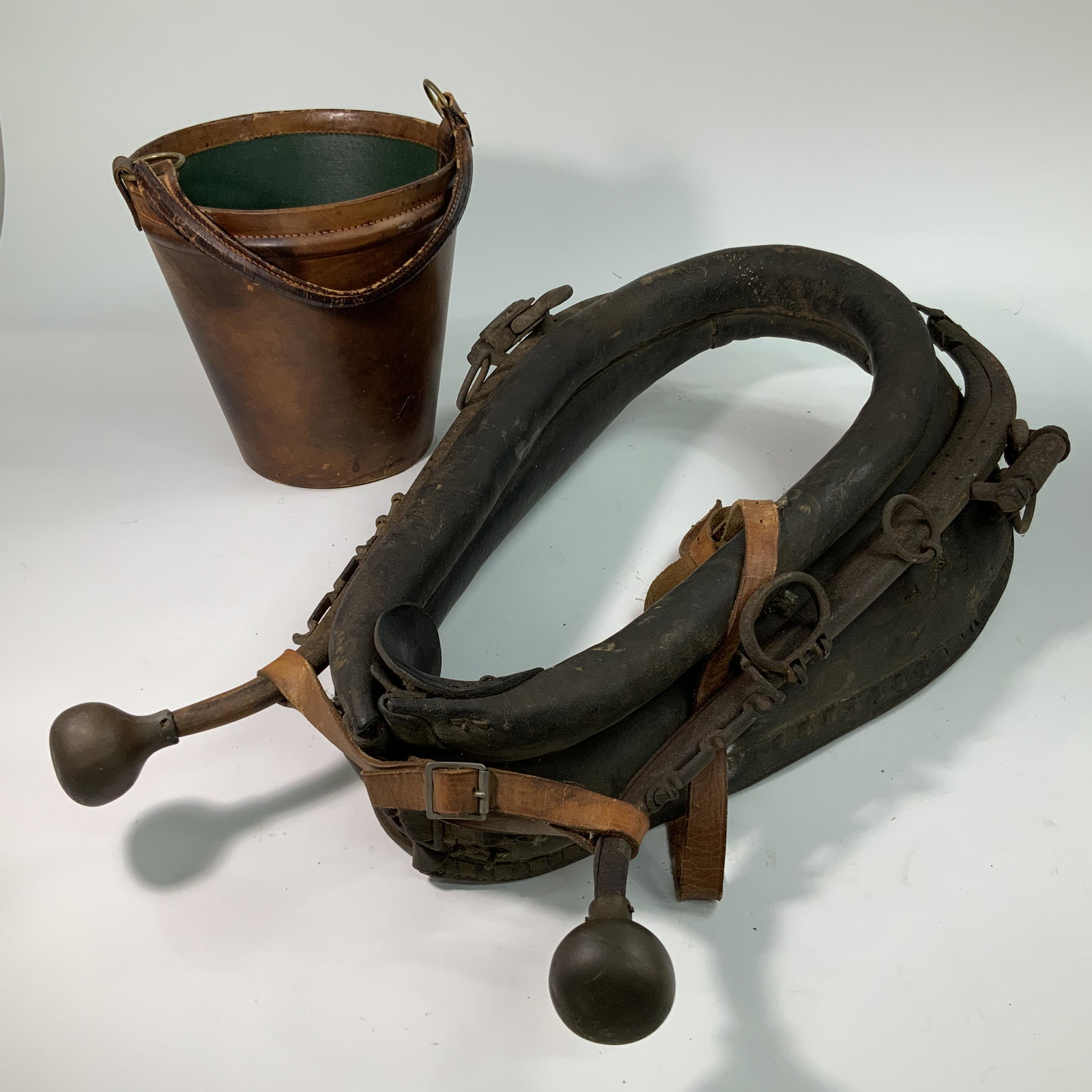 Horse Collar and Leather Bucket: Horse collar/hames, and a leather watering bucket.