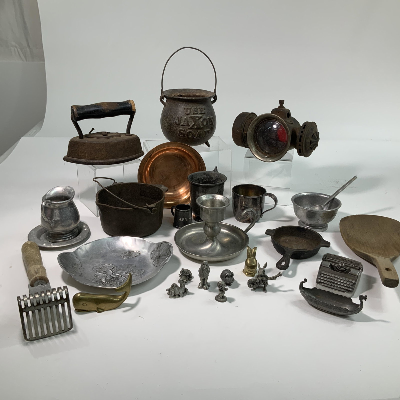 Lot of Cast Iron, Pewter, and Copper: Miscellaneous lot, including Jaxon's Soap kettle, a sad iron, and a carriage lantern.