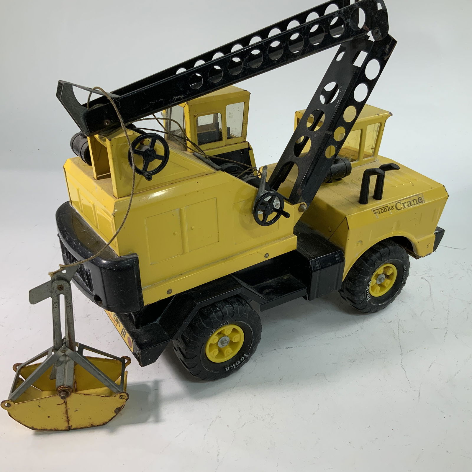 Tonka Crane: Yellow Tonka Crane, approx. 18" long.