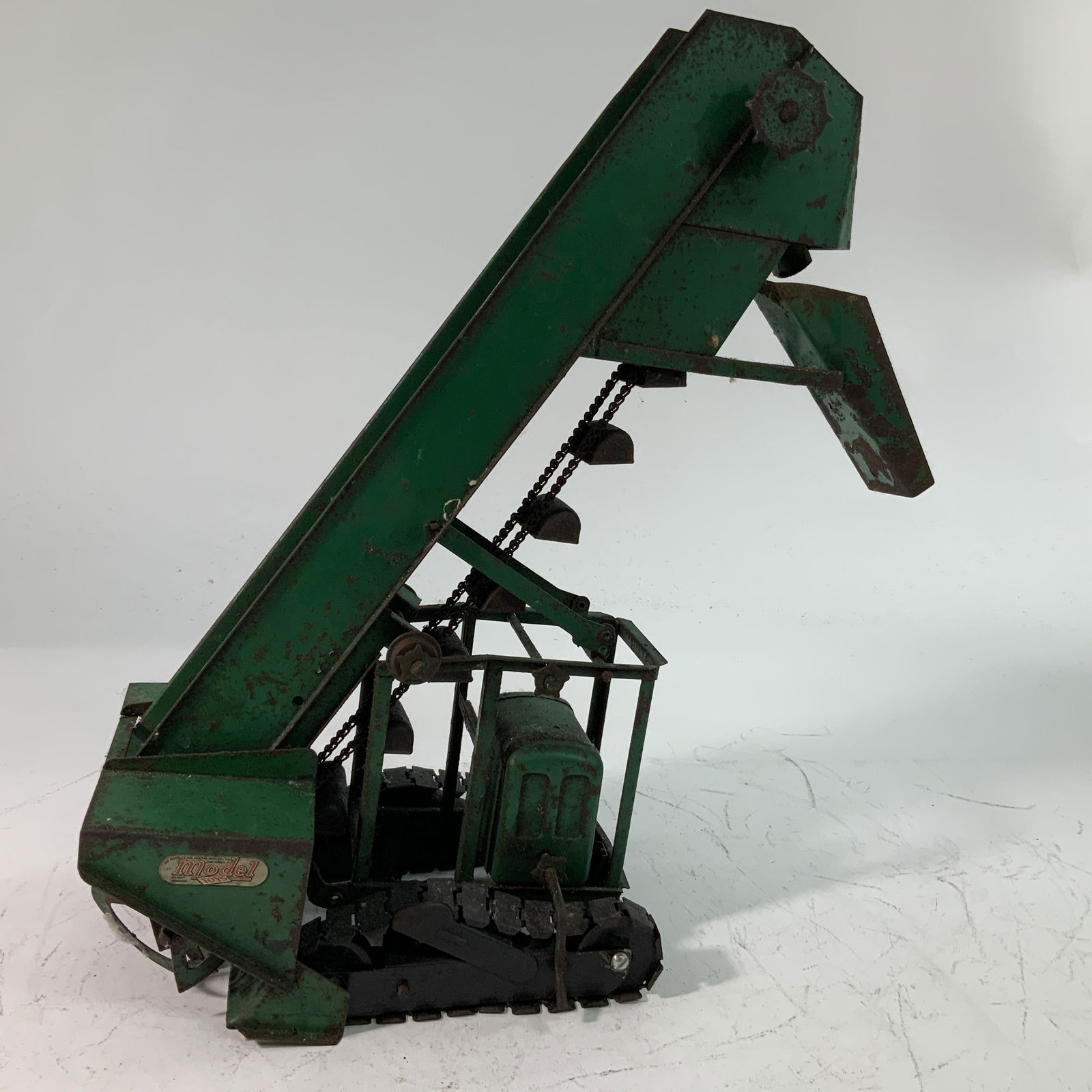 Model Toys Gravel Conveyor: Model Toys Gravel Conveyor, green with caterpillar treads and chain driven gravel buckets