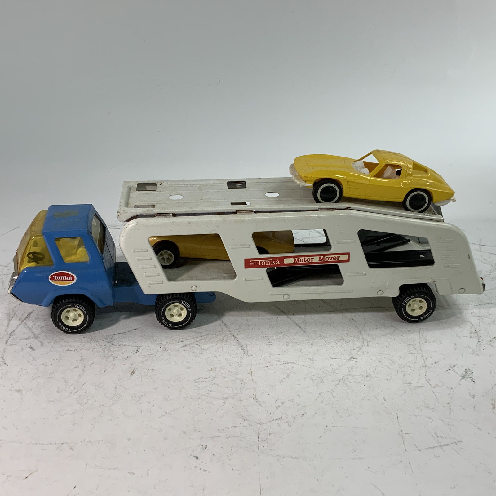 Tonka Car Hauler: Tonka Car Hauler, with ramps and 2 plastic Corvettes. Approx. 18" Long.