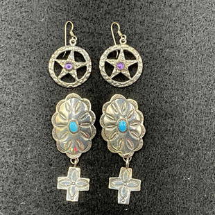 Two Pairs of Native American Sterling Earrings: Two Pairs of Native American Sterling Earrings for pierced ears- One pair of oval medallions with turquoise insets and dangling crosses (2 1/4" long), and one pair of circled star with amethyst settin