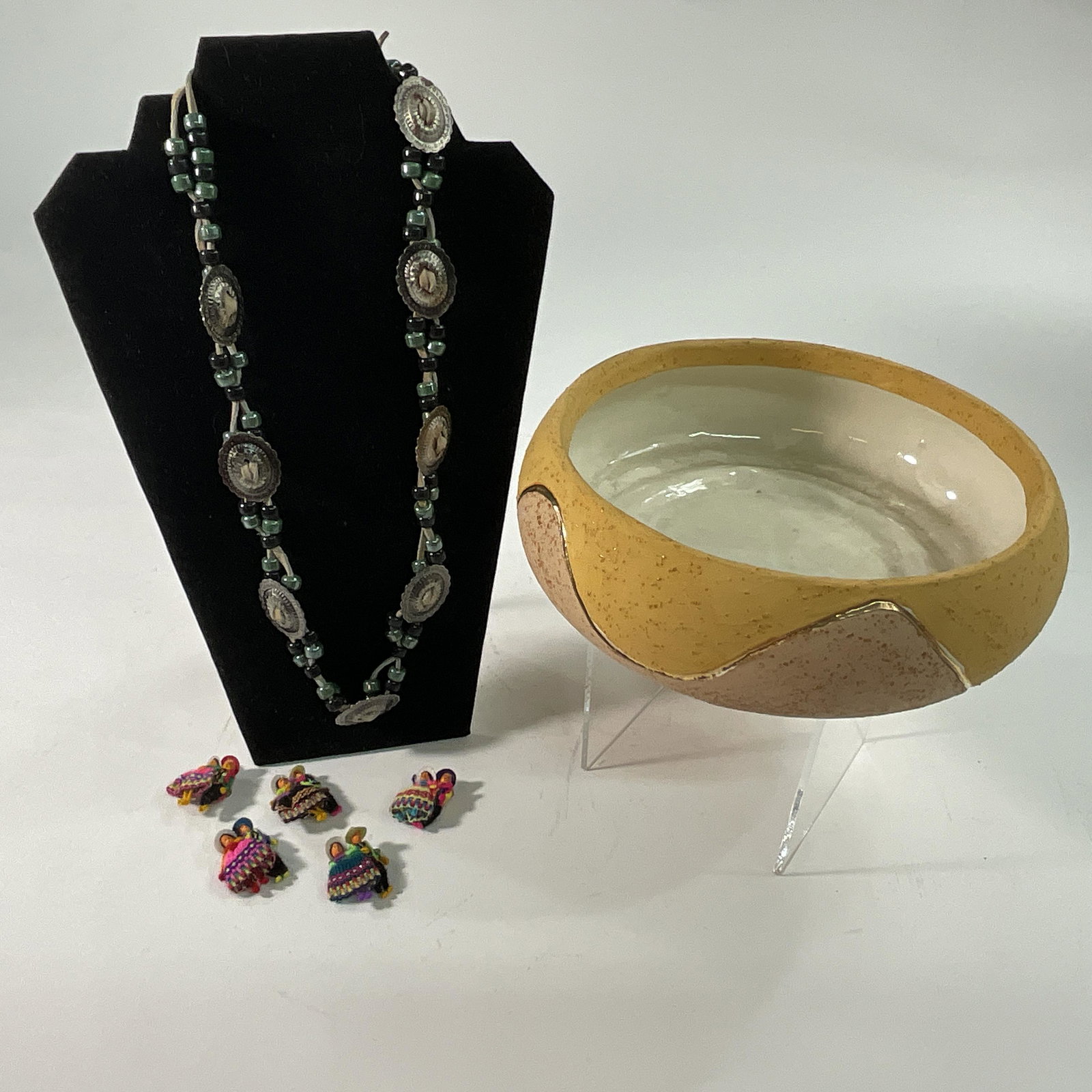 SW Style Necklace, Bowl, Pins: Rawhide Necklace with Steel Conchos and Green & Black beads, a 9" diameter ceramic bowl, and Five colorful woven & ceramic couples pins.