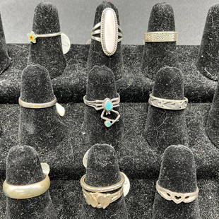 Ten Sterling Rings: Group of ten sterling rings, size 6. Various styles.