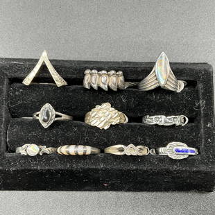 Ten Sterling Rings: Group of ten sterling rings, size 6. Various styles.