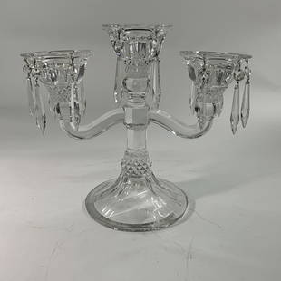 Shannon Irish Crystal Candelabra: Shannon Irish Crystal Candelabra. A triple candelabra with 14 faceted prisms. Approx. 11 1/2" tall, 12 1/2" wide, with a base approx. 6 1/2" in diameter.