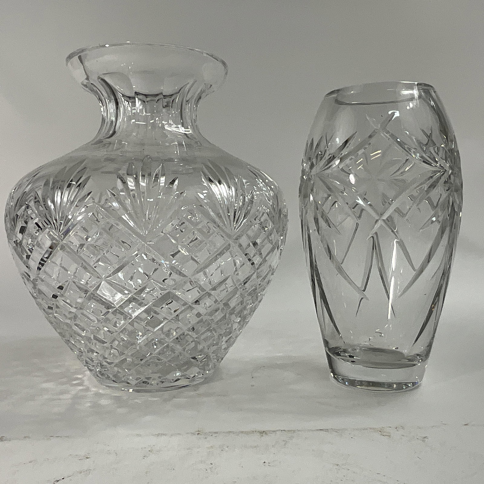 Lot of Crystal Vases: tall vases, bulb-shape and almond shape