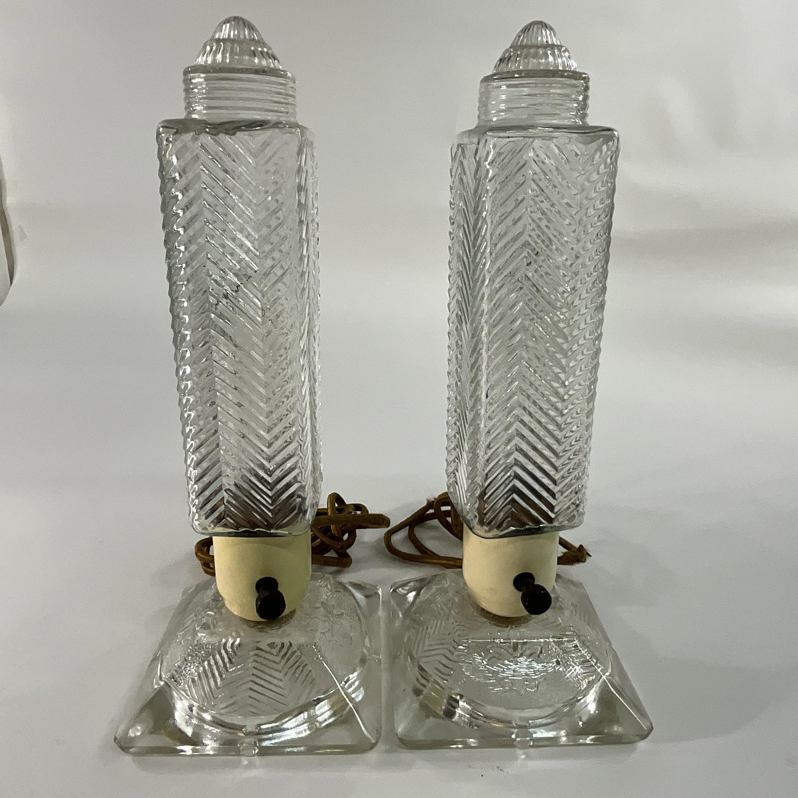 Pair of Art Deco Clear Glass Tower Lamps: Pair of Art Deco Clear Glass Tower Lamps, 12 1/2" tall.