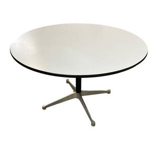 Herman Miller Round Table: White laminate top Measures 48" round by 29" High.