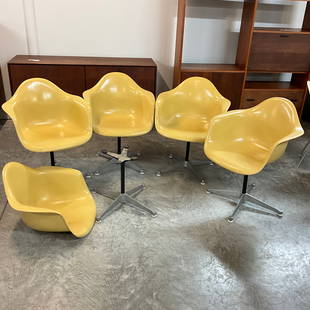 Set of 5 Herman Miller Yellow Arm Chairs: Yellow Fiberglass with swivel base.