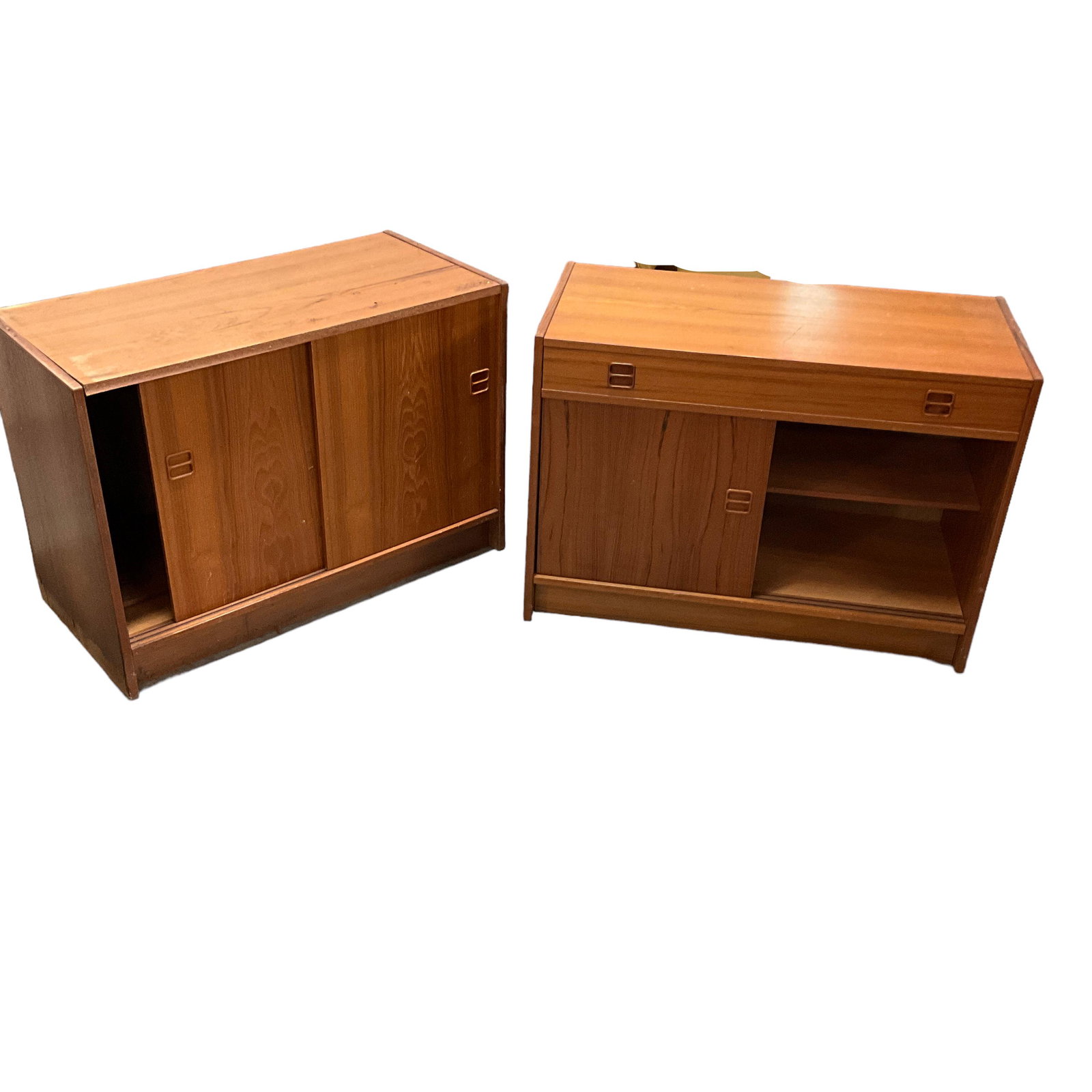 Danish Mid Modern Cabinet: Teak Wood, One Drawer, Two slide fronts. Measures 35"L x 17"W x 50"H