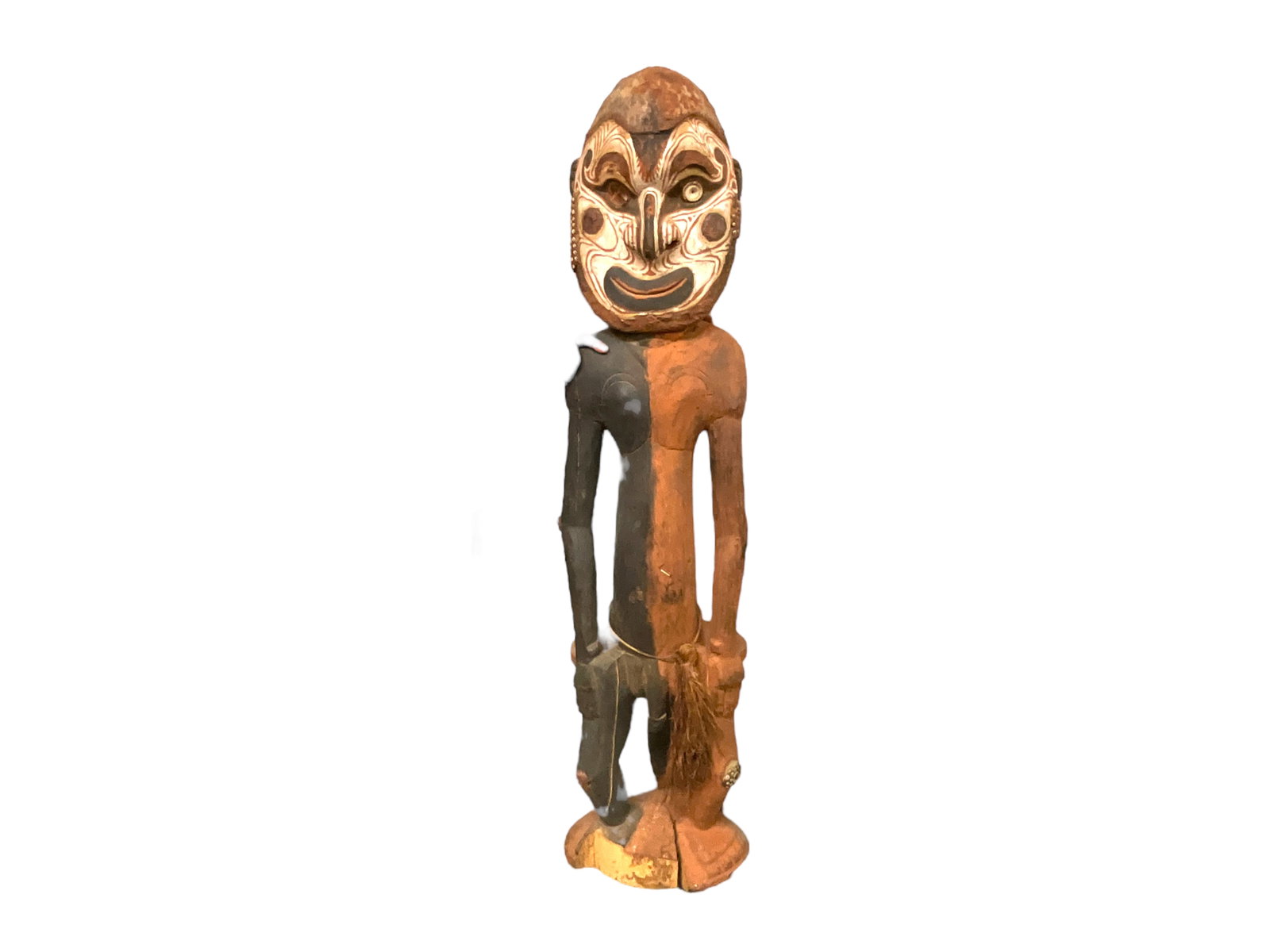 Papua New Guinea Orator's Stool: A carved wooden orator's stool from the Sepik River region of Papua New Guinea. Approx. 57" tall, 14" wide, and 13" deep. He is missing one of his shell eyes, has a large chunk missing from the base, 