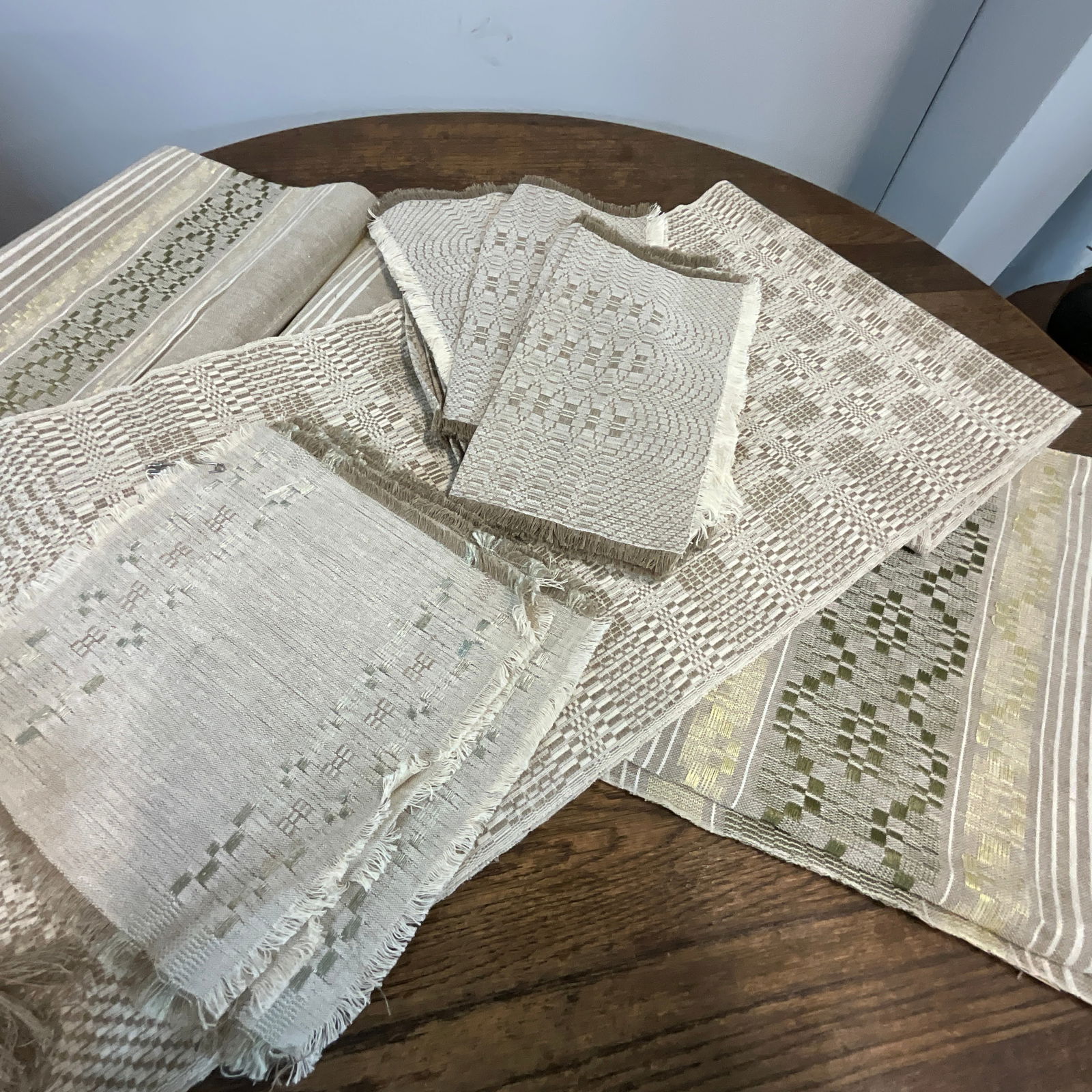 Vintage Lithuanian Linens: Vintage Lithuanian Linens, which appear to be hand woven. Consignor's Grandmother purchased these linens in Vilnius circa 1970, and they were stored, unused, until now. Most still have original sales
