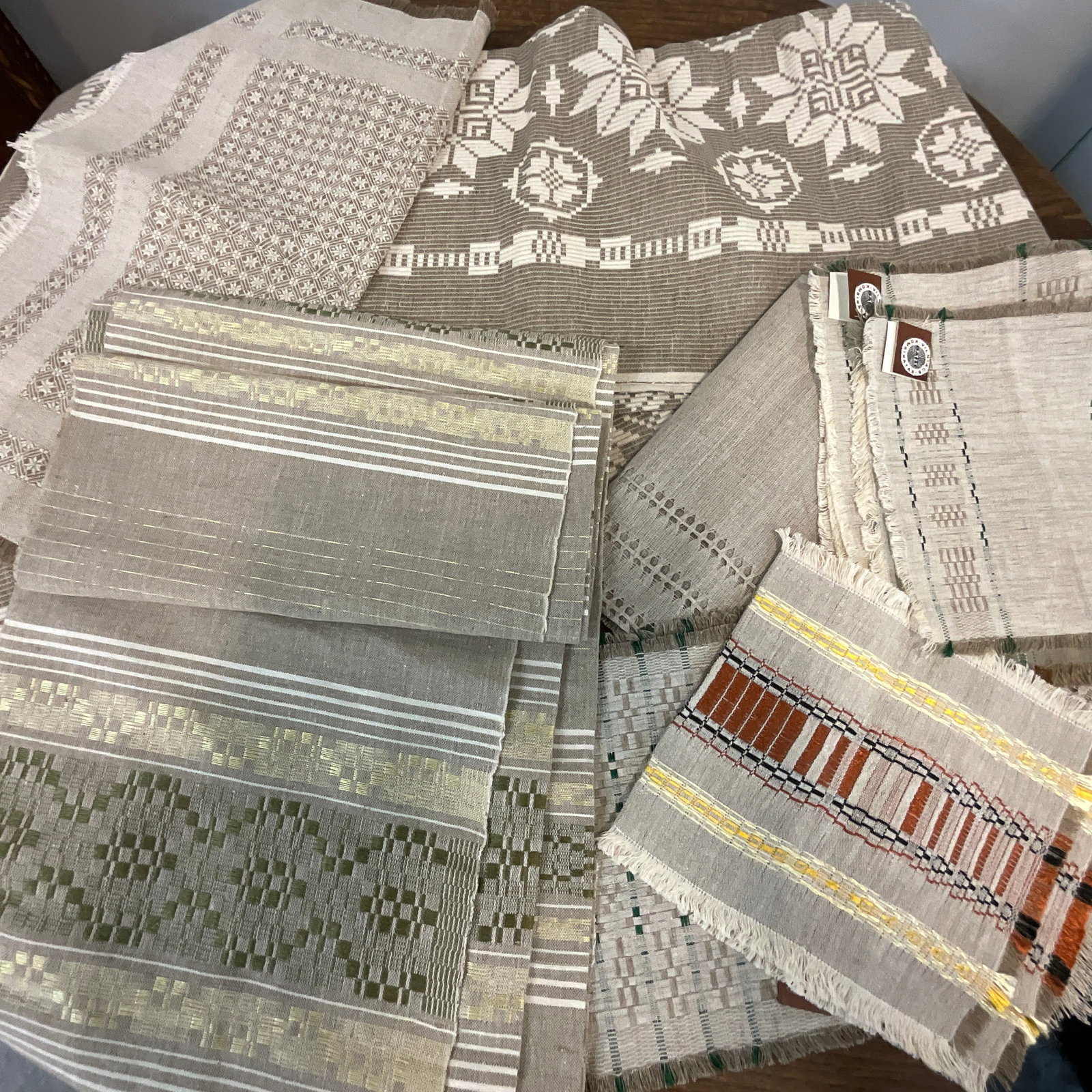Vintage Lithuanian Linens: Vintage Lithuanian Linens, which appear to be hand woven. Consignor's Grandmother purchased these linens in Vilnius circa 1970, and they were stored, unused, until now. Most still have original sales