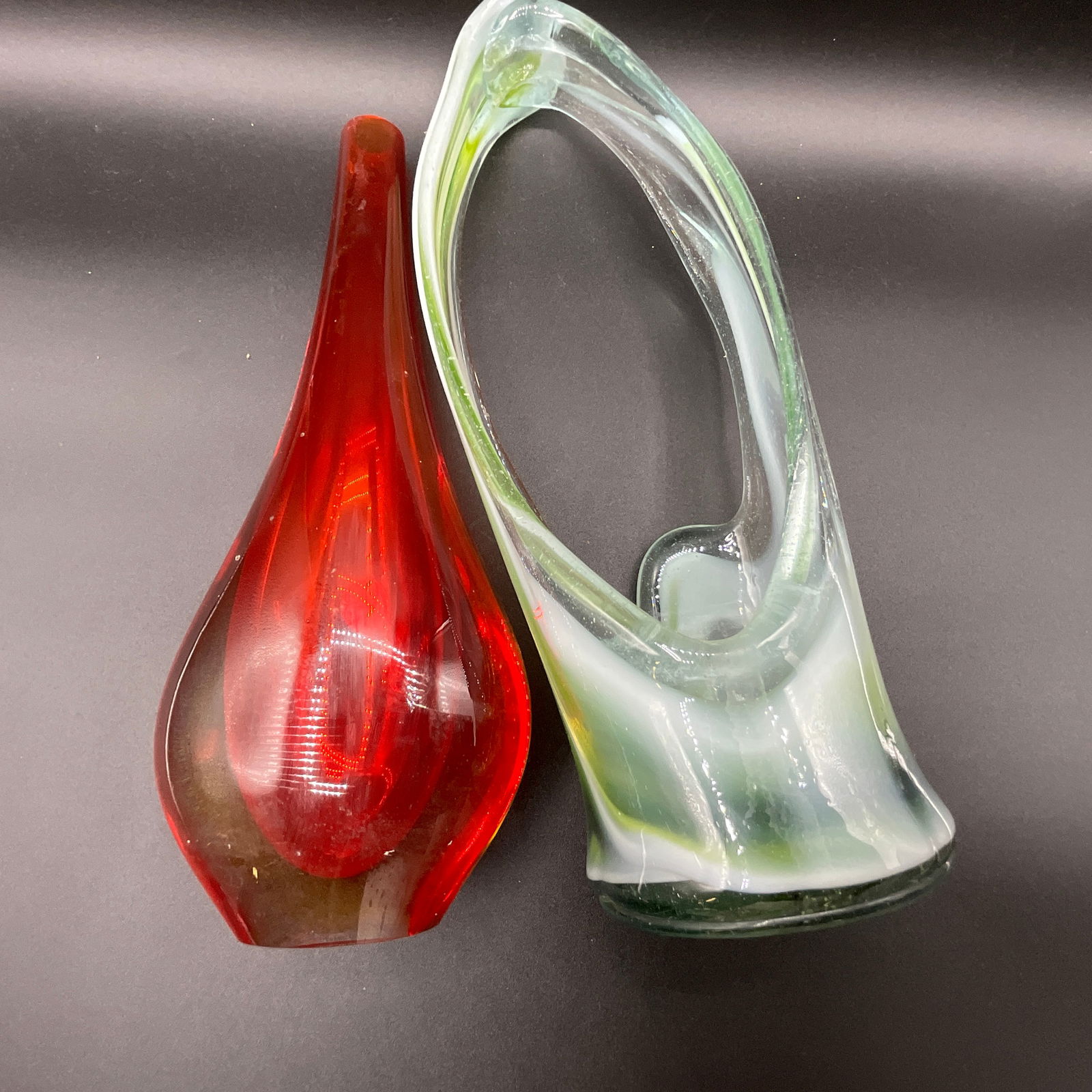 Mid-Century Modern Vase and Candle Holder: Heavy glass vase- red with hints of yellow. Possibly Blenko or Pilgrim Glass. Approx. 11.5" tall. Free form green/white slag glass candle holder, approx. 12.5" tall.