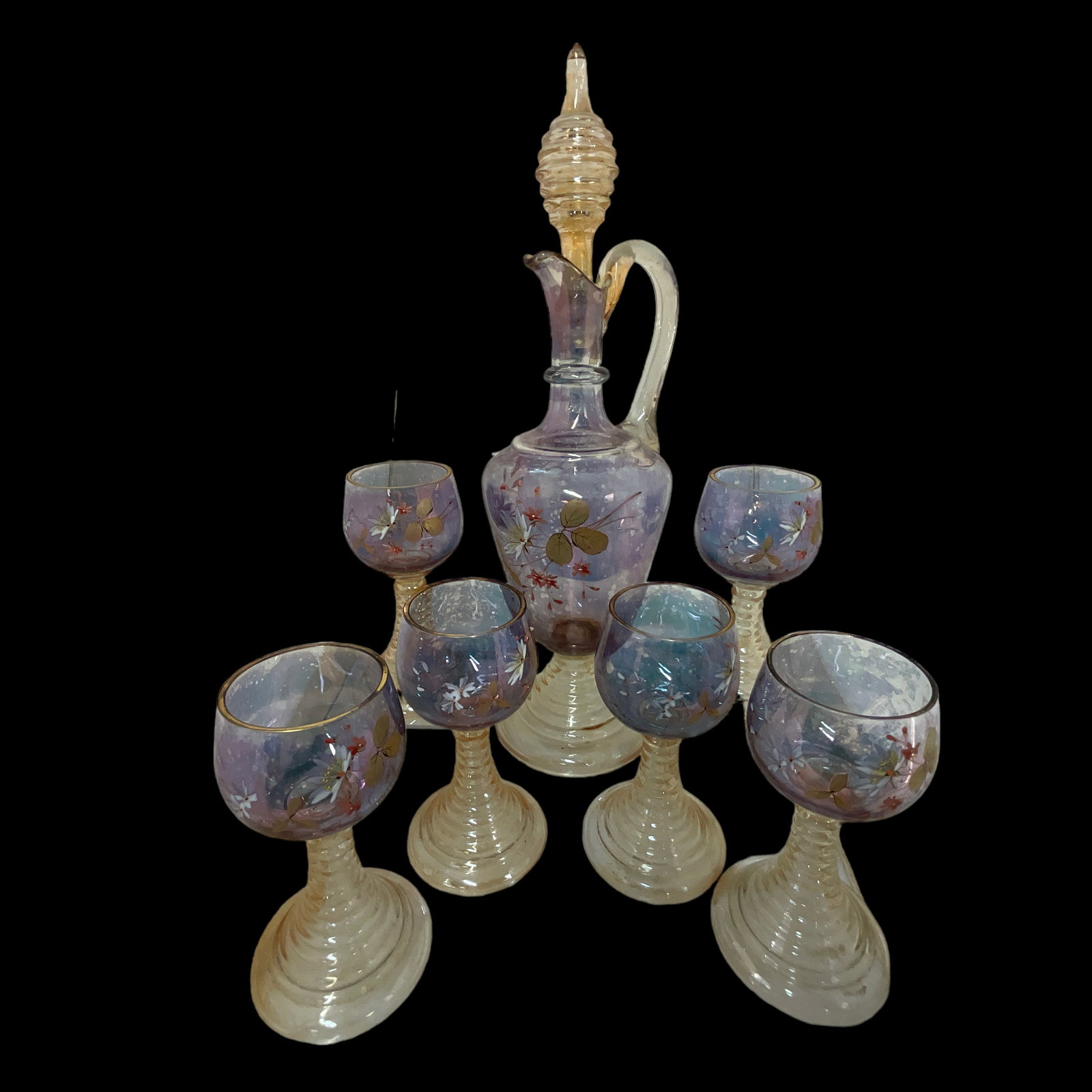 Bohemian Flash-Tint Amethyst Decanter with 6 Wine Glasses: 19th Century Bohemian Flash-Tint Amethyst Decanter with 6 Wine Glasses. One glass has chip on base. Decanter is approx. 16" tall, glasses approx. 6.25" tall.