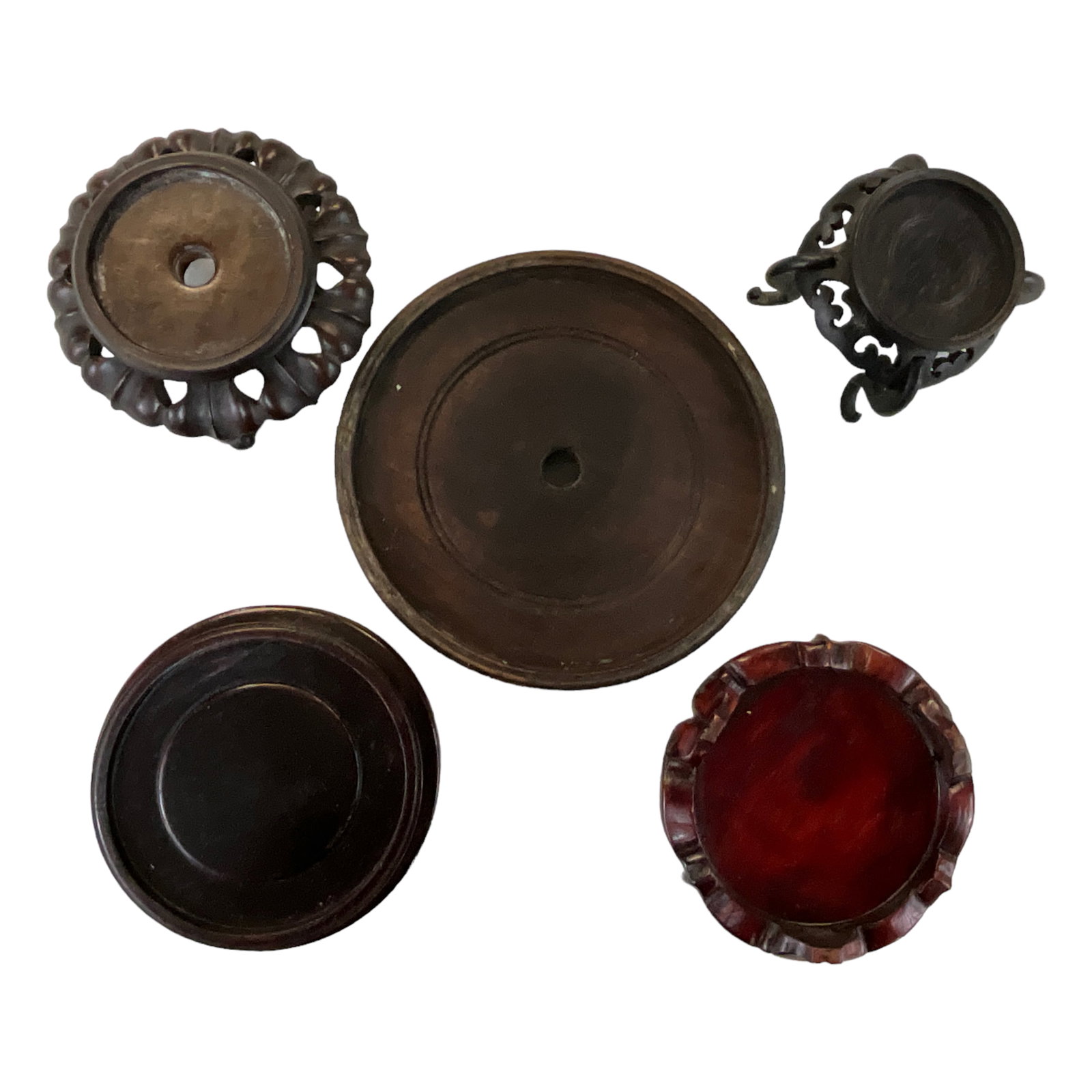 Chinese Wooden Urn Bases: Group of five Chinese wooden urn bases, the largest measuring approx. 6" in diameter.
