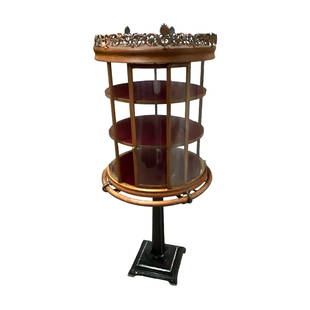 Victorian Country Store Circular Display Case: Cylindrical display case, made by the Crystal Display Case Co. Alliance, O. USA. Pat May 14 '89, Jan 5, '97, Jan 23, 1900. Iron pedestal base, with a cylindrical upper case of oak and glass with a sli