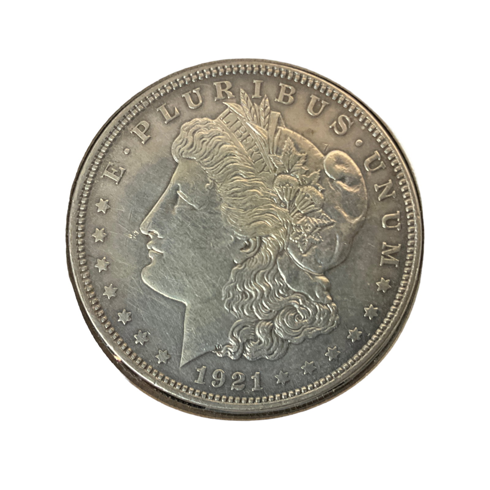 1921 US Morgan Silver Dollar, Grade AU: 1921 Morgan Silver Dollar (no mint). Grade: AU