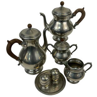 Pewter Table Serving Set, Lot of 7: Pewter Table Serving Set. Includes Coffee and tea servers with wood handles and top finial, sugar and creamer, salt & pepper shakers w/tray. Marked.