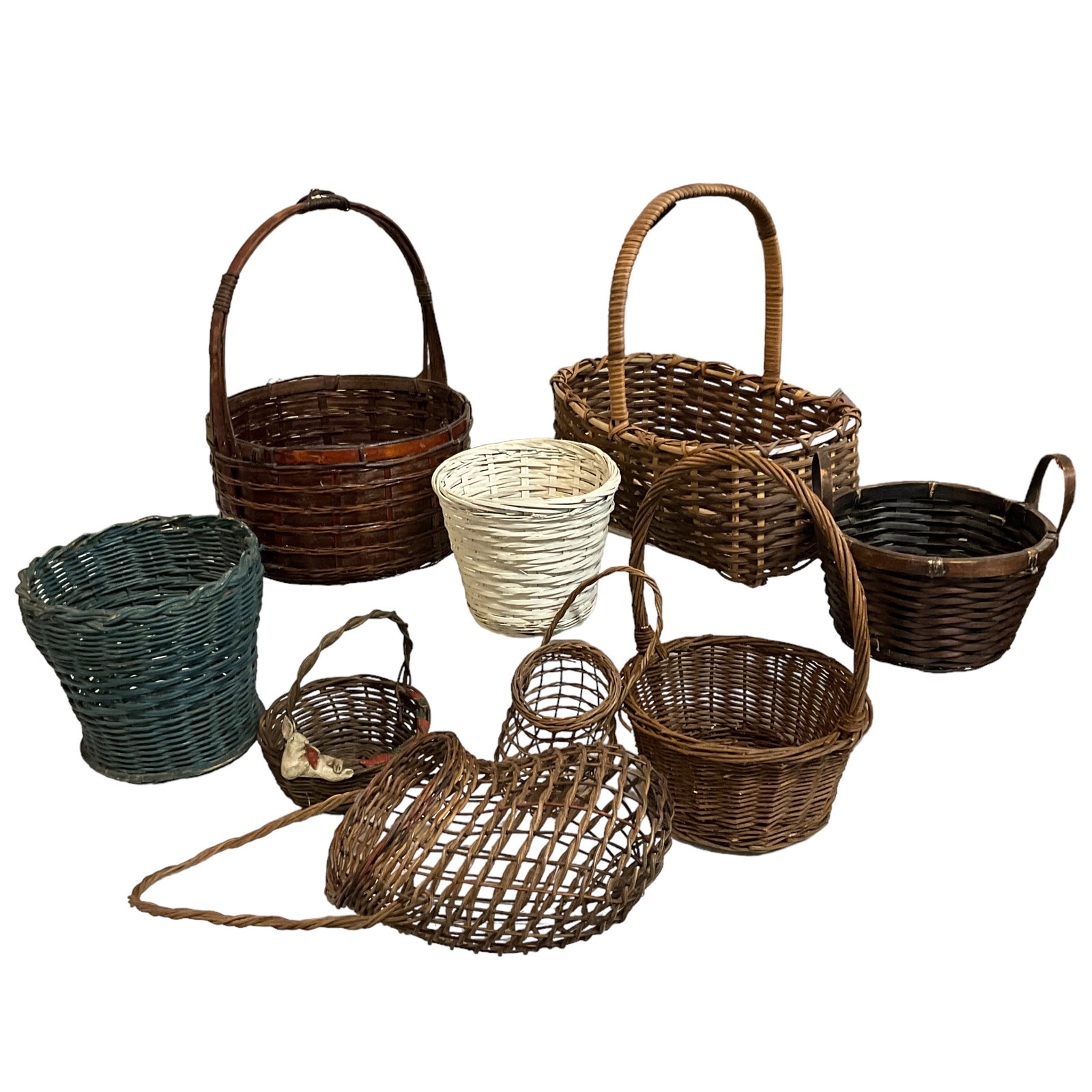 Woven Baskets, Lot of 9: Assortment of woven baskets. Largest measures approx. 9 1/2" diameter, 5" basket, 12 1/2" tall including handle.