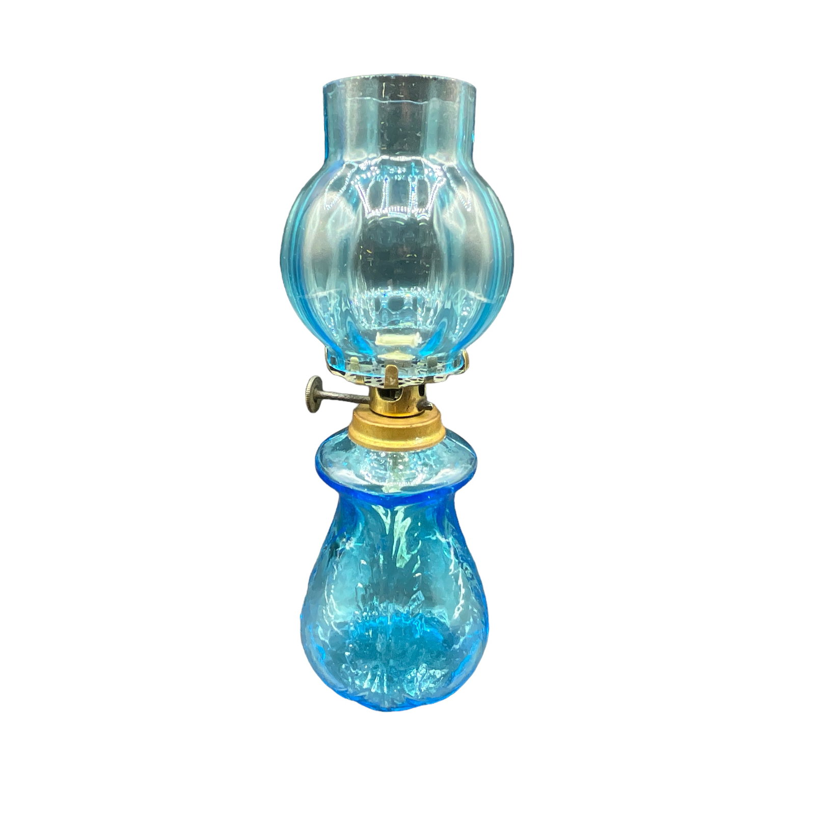 Miniature Victorian Oil Lamp, Blue Glass: Embossed blue glass oil lamp. Includes base, shade, and burner. Light chipping on top rim of shade. Measures approx. 7 1/4" tall, 2 1/2" diameter.