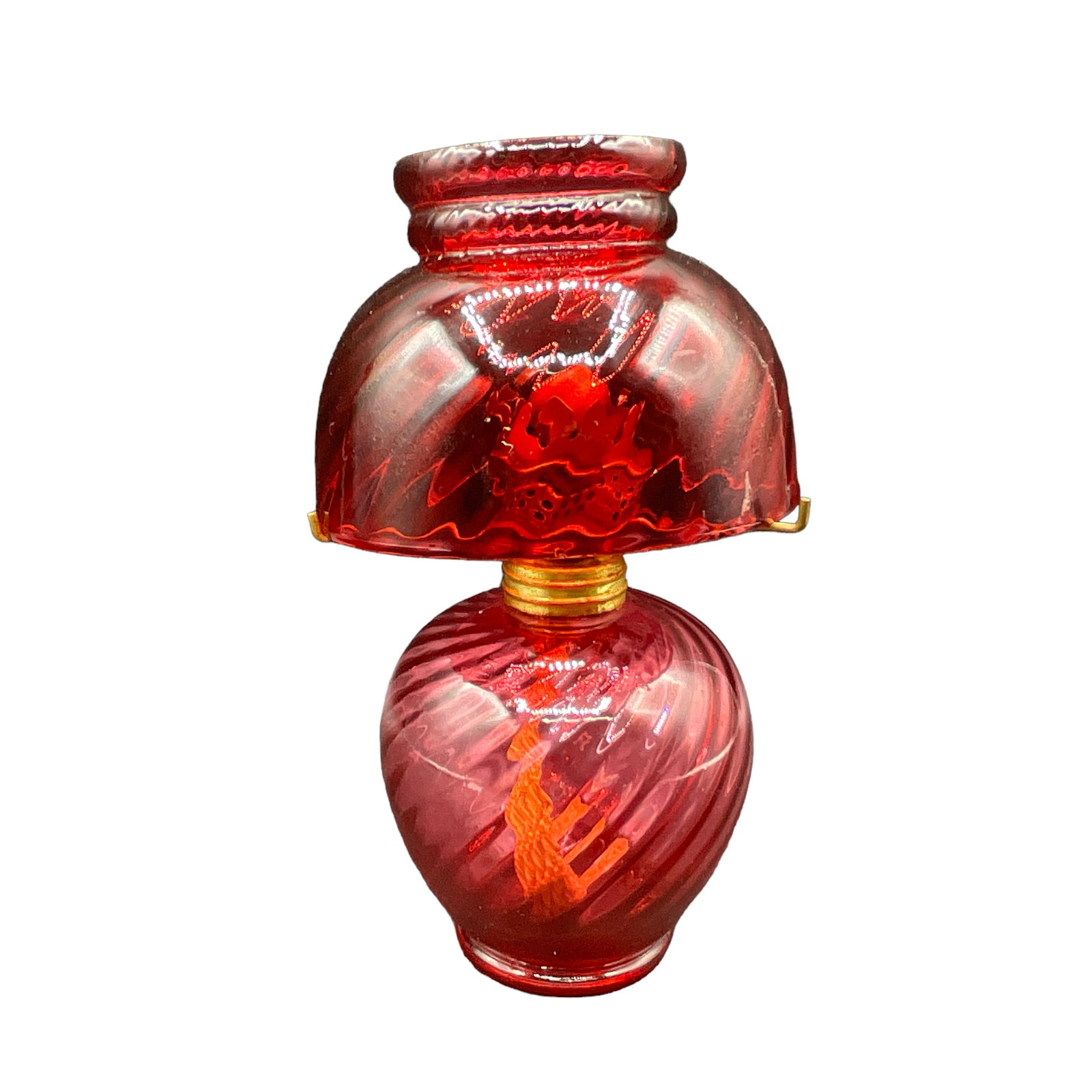 Miniature Victorian Oil Lamp, Cranberry Glass, Swirled: Swirled cranberry glass oil lamp. Includes base, shade, and burner. Measures approx. 7" tall, 4" diameter.