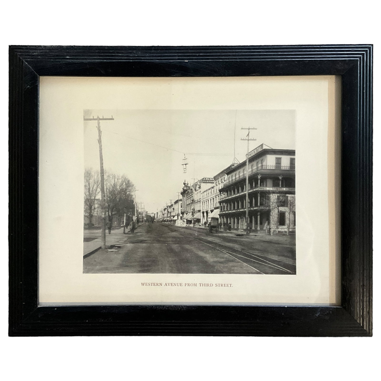 Downtown Muskegon Print, Occidental Hotel: Print of Downtown Muskegon "Western Avenue from Third Street" featuring the Occidental Hotel (circa early 1900's?). Measures approx. 12" x 15" OA; 7" x 9" SS.