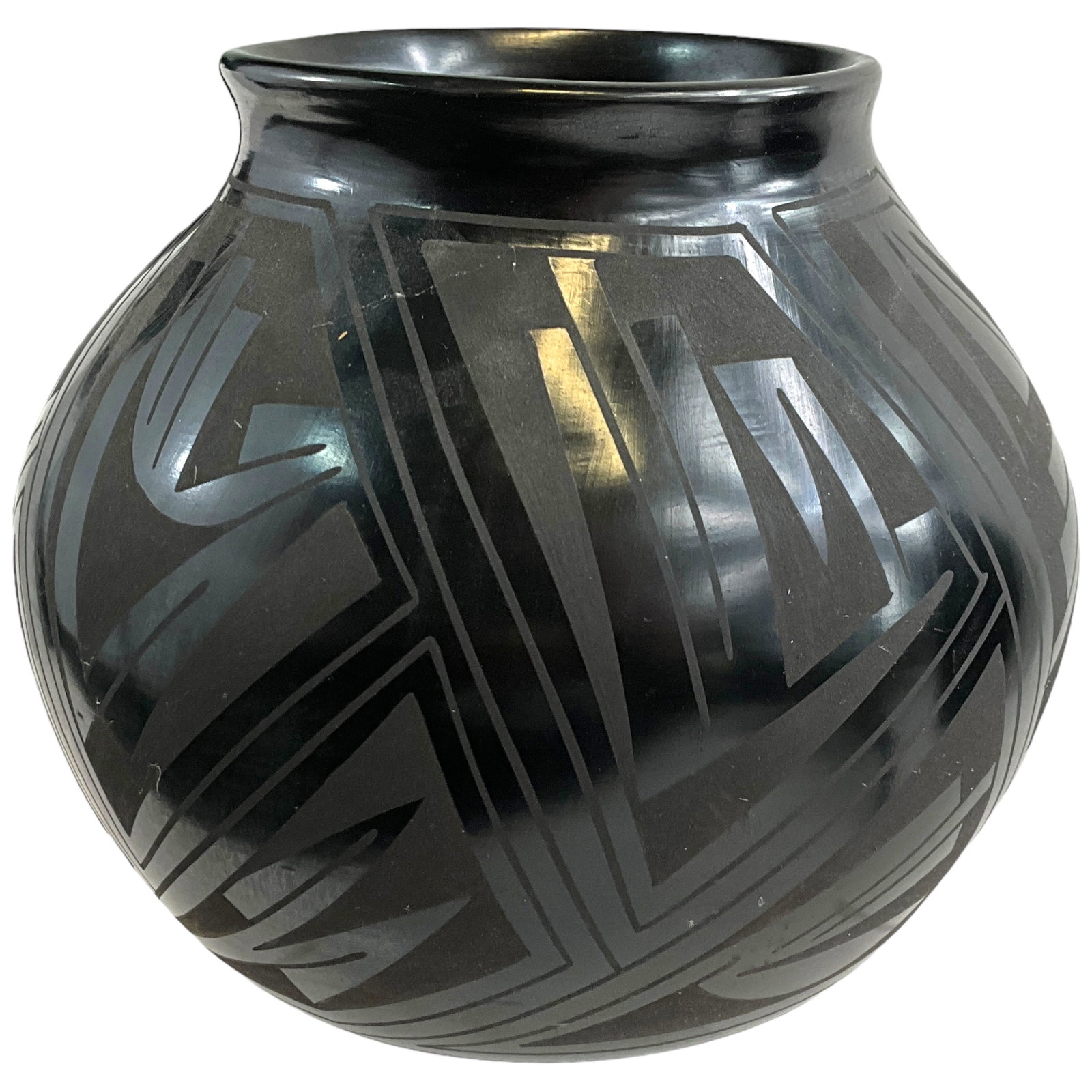 Thomasa Mora Pottery, Southwestern Style, Blackware Jar: Thomasa Mora signed Southwestern style, black on black, pottery jar. Measures approx 6" tall, 6.5" in diameter.