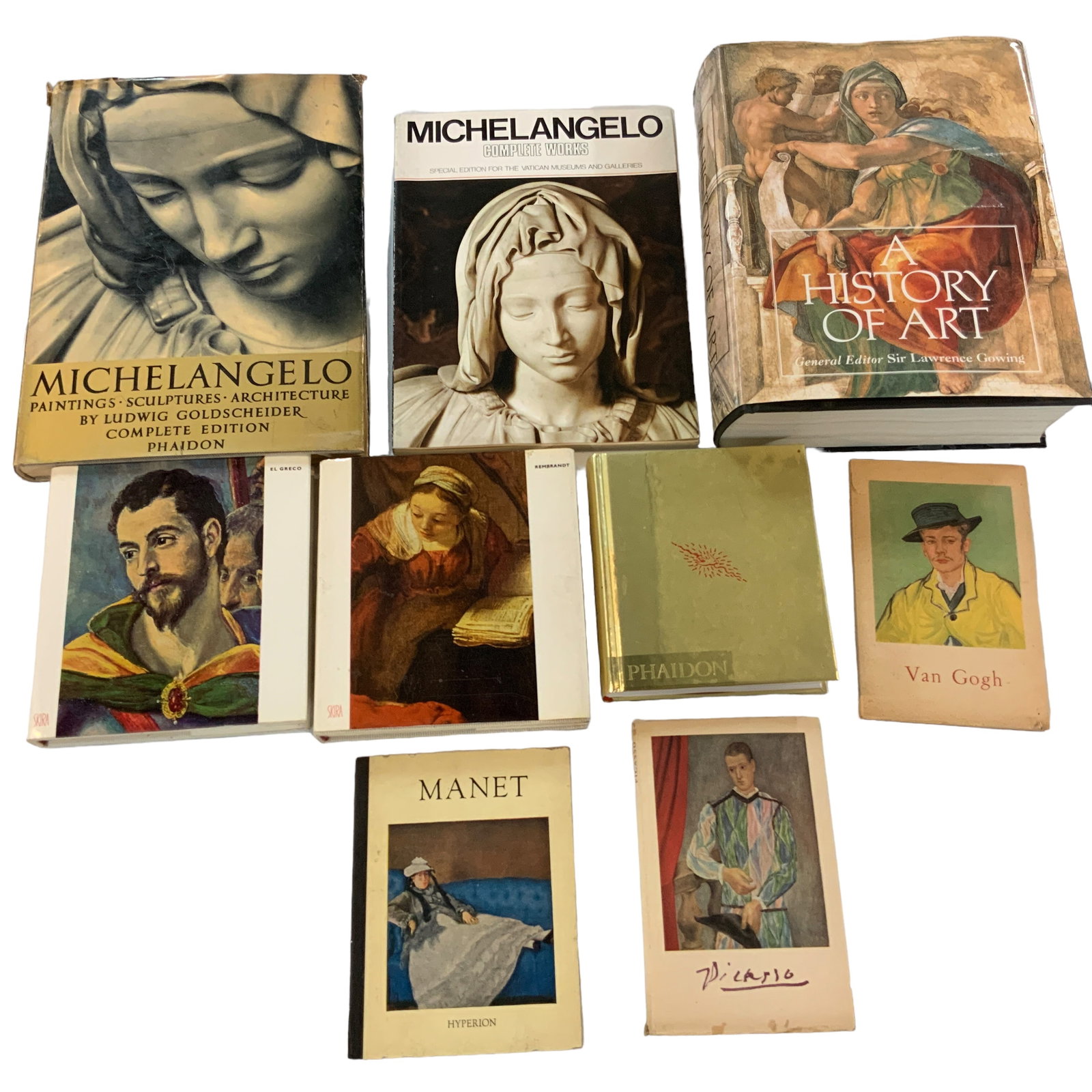Art Books, Lot of 9: Lot of 9 soft- and hard-cover books featuring art works and supporting information. Titles include Van Gogh, Picasso, Manet, Rembrandt, El Greco, Annunciation, A History of Art, Michelangelo, and Mich