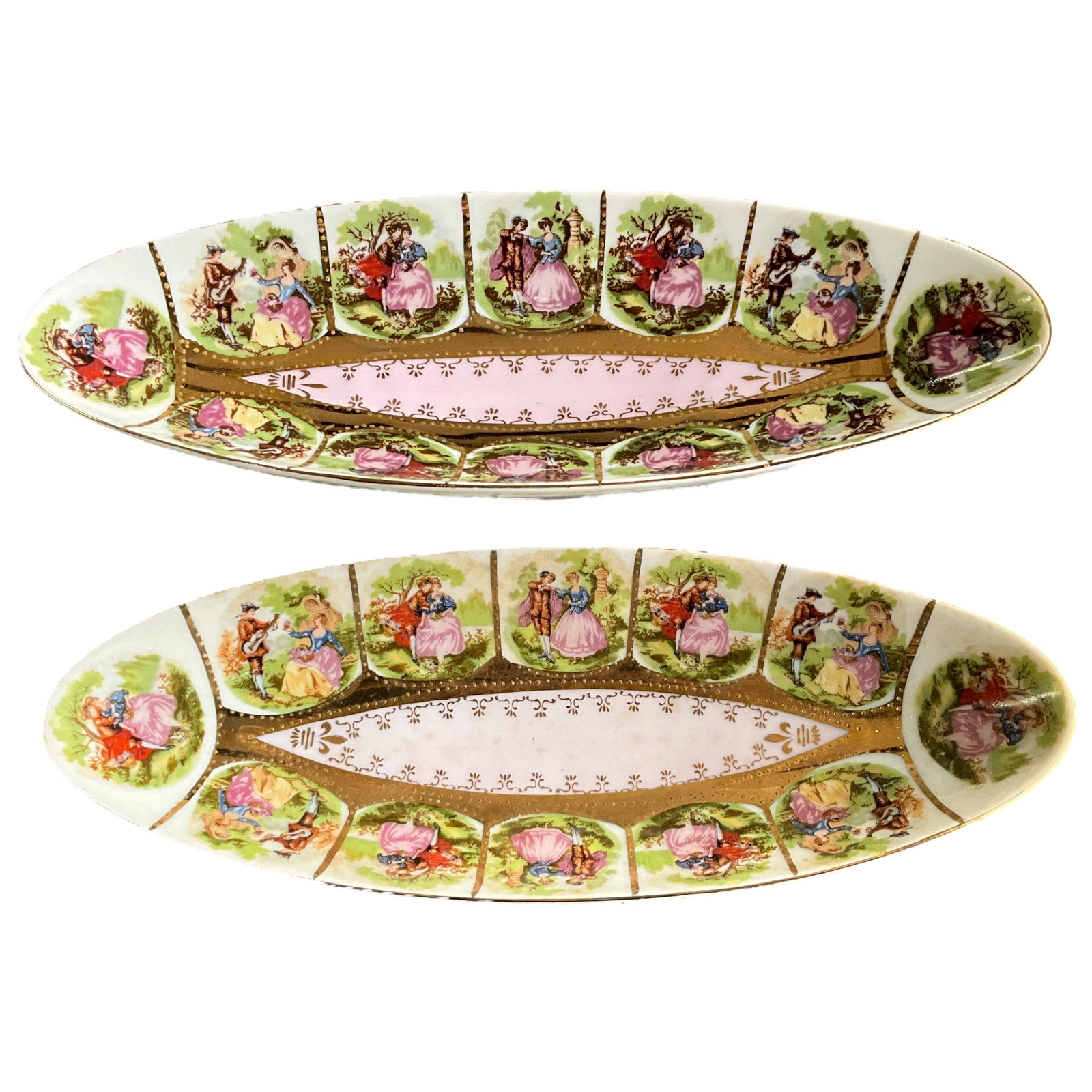 Royal Vienna Porcelain Condiment Dishes: Pair of antique Royal Vienna porcelain condiment dishes featuring a courting couple. Measures 3.5" x 10".
