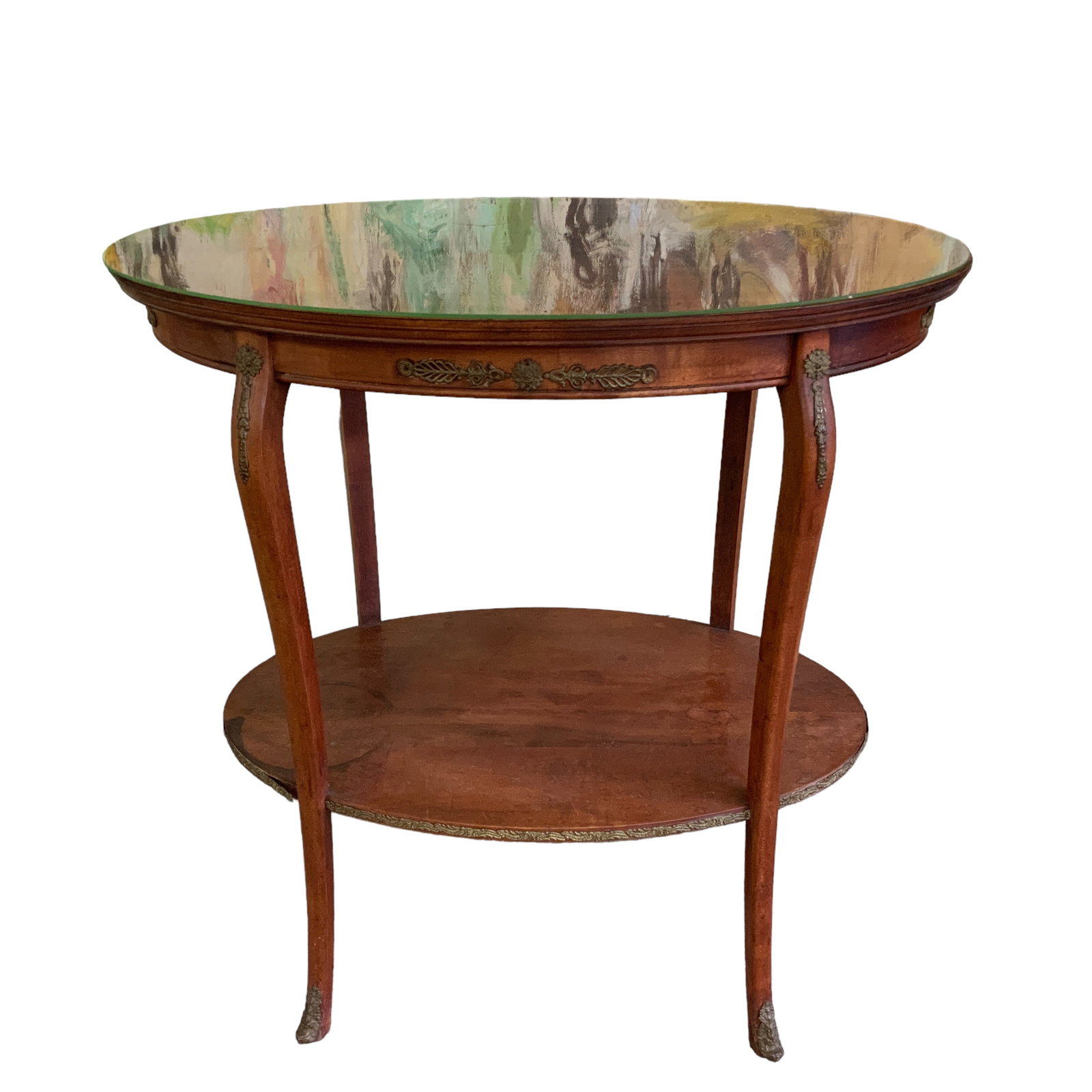Oval Side Table w/Glass Overlay, Wood: Wood, oval-shape side table with glass top overlay and lower shelf. Table sides and legs have metalwork overlays. Wood table top and shelf both have water spot damage. Table stands approx. 29" tall, 2