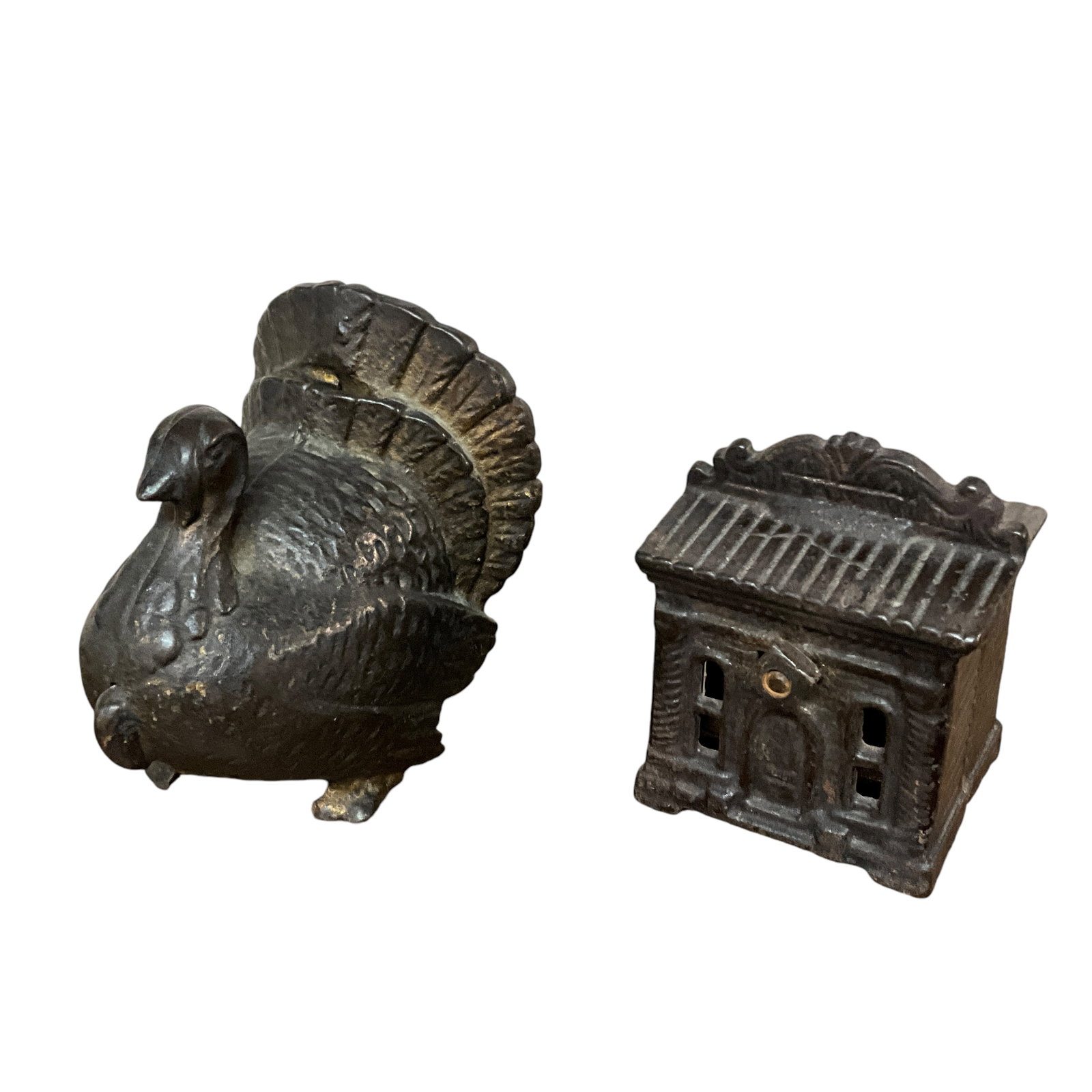 Pair of Cast Iron Banks: Pair of Cast Iron Banks- Turkey, and a bank building.. Turkey is approx. 3.5" long and 3.5" high. Bank is approx. 2.25" long, and 2.5" high.