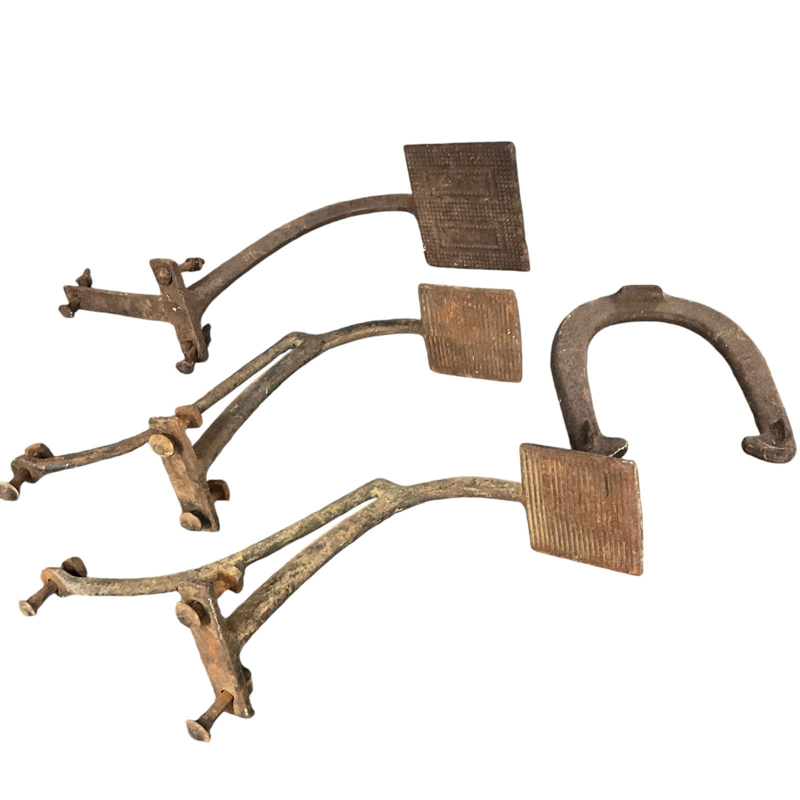 Carriage Steps, Horse Shoe: A pair of iron carriage or buggy steps, and a single step of similar style. Also a large iron horse shoe. The pair of steps have a 9" drop and are approx. 15" long.