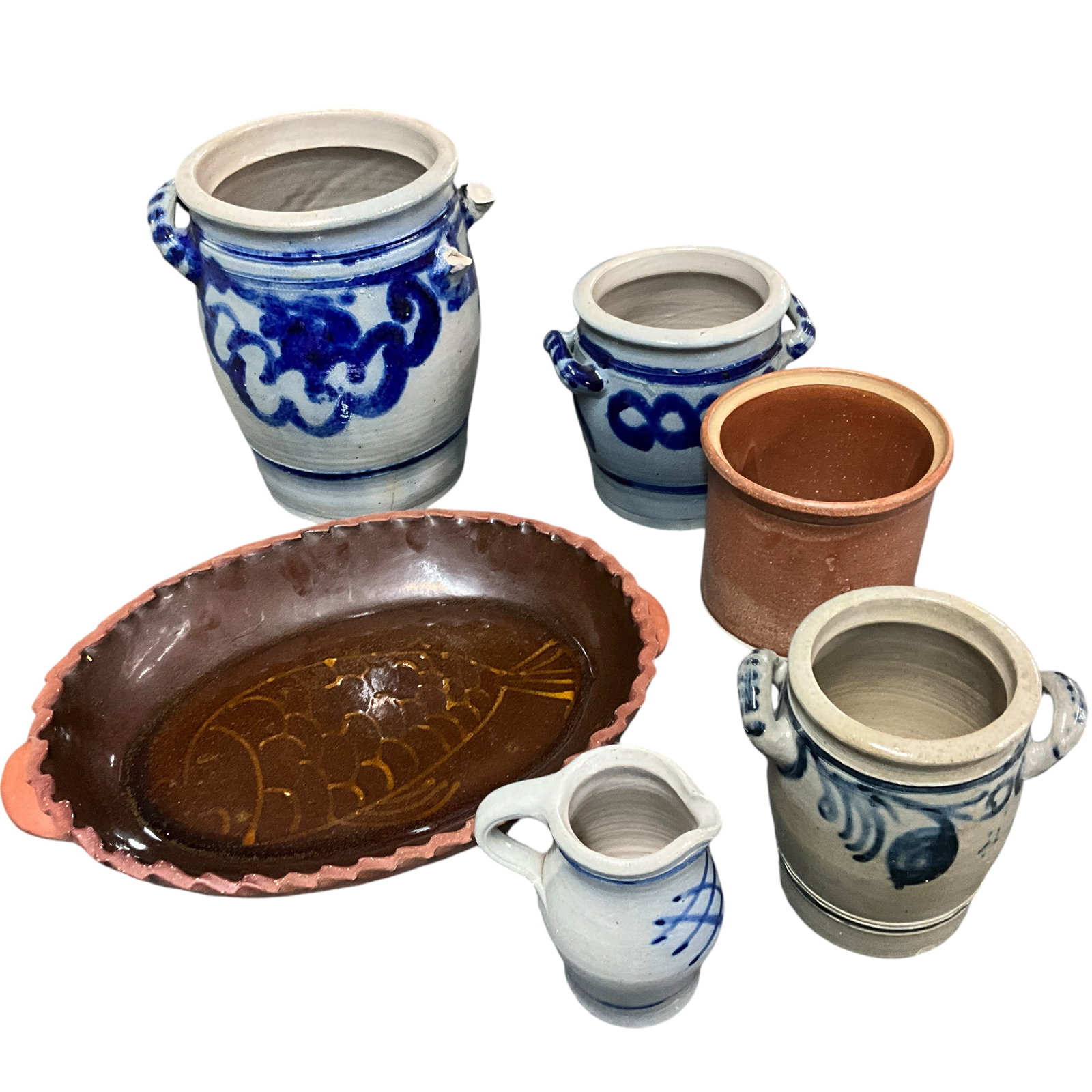 Lot of Modern Stoneware: Lot of Modern Stoneware- Three salt glazed crocks with cobalt decoration, a redware wine cooler, a small salt glazed pitcher, and an oval redware baking dish, with fish decoration. Largest crock is ap