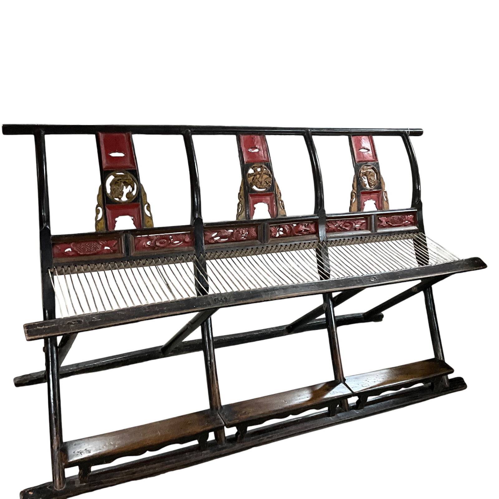 Early Qing Dynasty Chinese Folding Bench: Early Qing (1644-1912) Dynasty Chinese Folding Bench. Three seat folding bench with cord seat supports. Curved seat back with carved decorative panels and back splats. Painted in black, with red and g