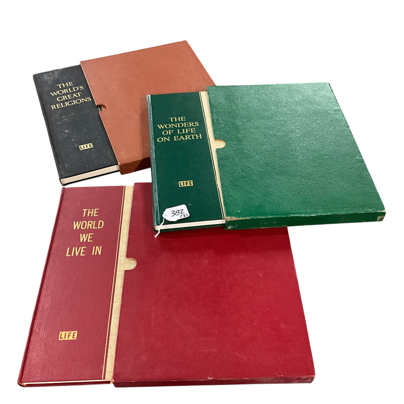 Lot of Three Large Format Time Life Pictorial Histories in Dust Sleeves: Lot of Three Large Format Time Life Pictorial Histories in Dust Sleeves. Group is comprised of The World's Great Religions, The Wonders of Life on Earth, and The World We Live In. Each measures approx