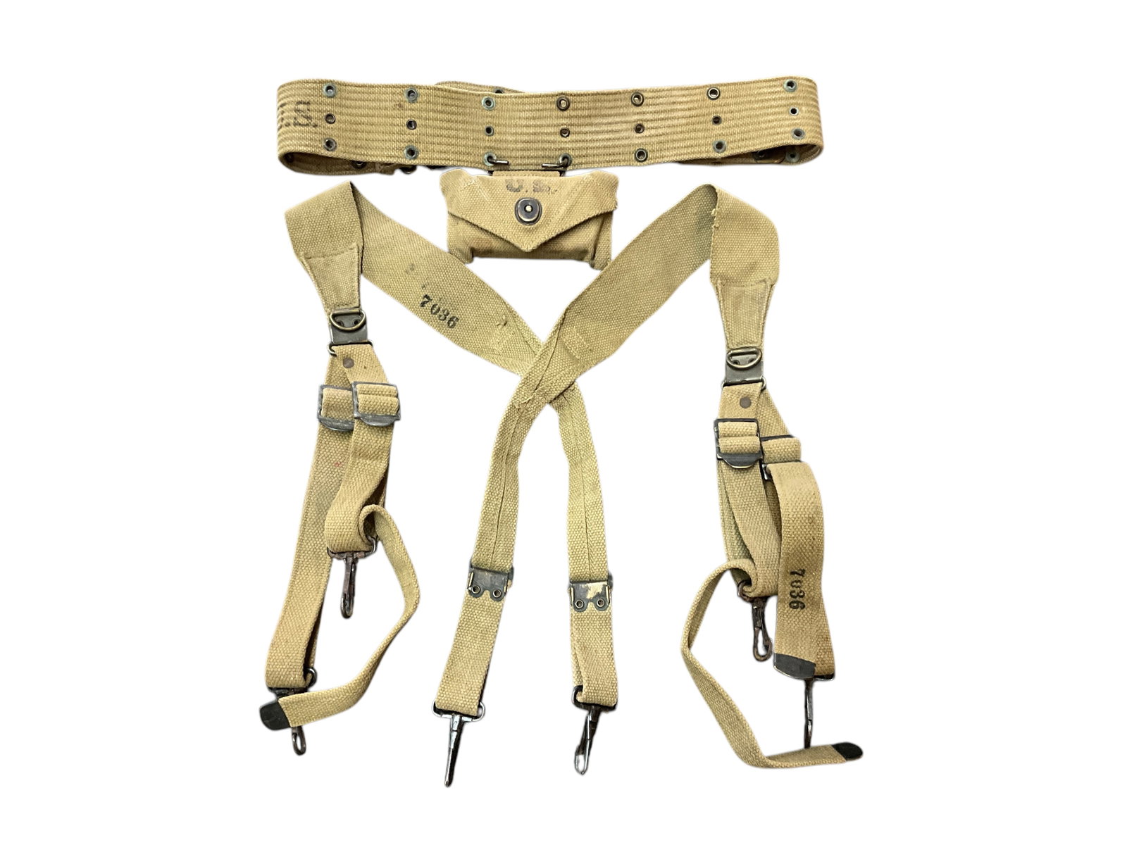 WWII Web Gear: WWII Web Gear- A pair of US M1936 "X" pattern suspenders and pistol belt, with a first aid pouch and unopened carlisle bandage in the metal Spam can packaging. NOTE- We have been unable to get the Lif