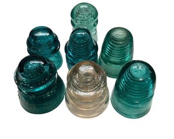 Group of 7 Antique Glass Electrical Insulators- Hemingray, Dominion, H.G. Co. Petticoat