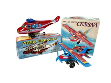 Two Wind-up Lithographed Tin/Plastic Aircraft