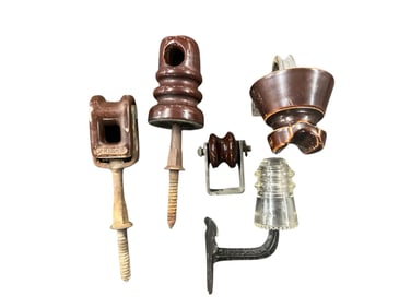 Five Glass or Ceramic Electrical Insulators with Metal Fittings.