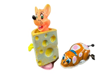 Lithographed Tin/Plastic Key Wind Toys.