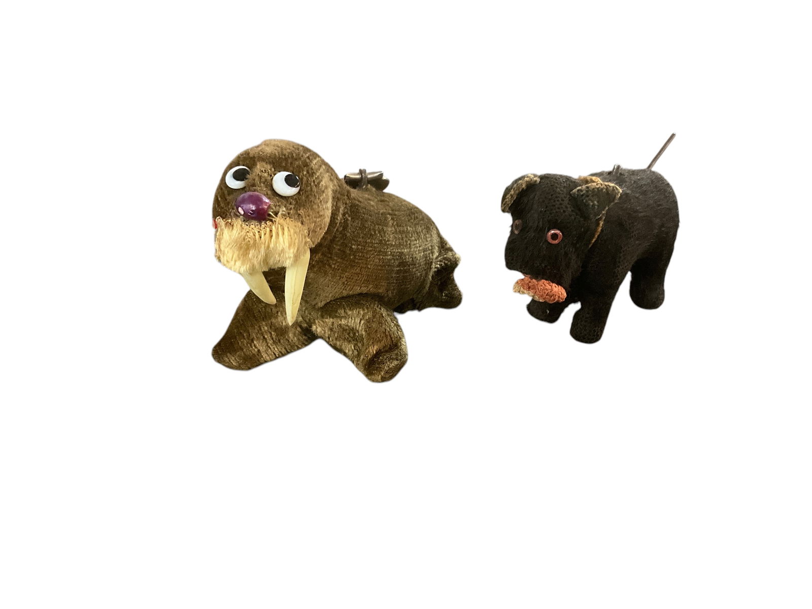 Key Wind/Wind-up Animals: Key Wind/Wind-up Animals- a walrus wind-up toy that has some functionality- he will move a bit, but needs a nudge to keep going. It could be that he needs to be wound up more, but we will leave that t